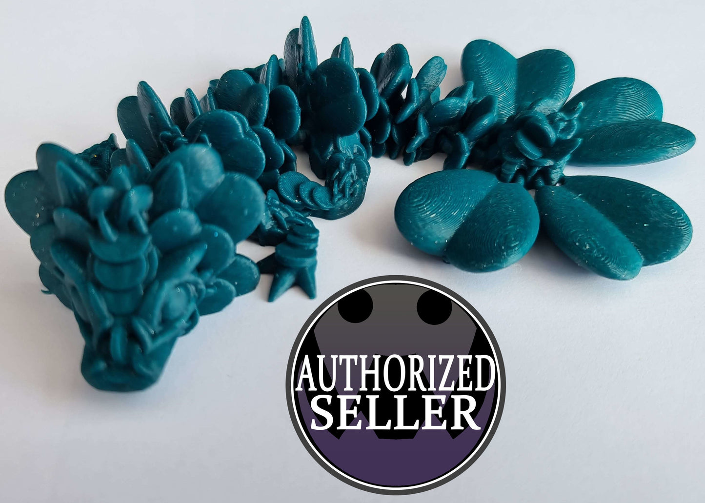 Teal 3D printed dragon figurine with flower details and 'Authorized Seller' badge on white background