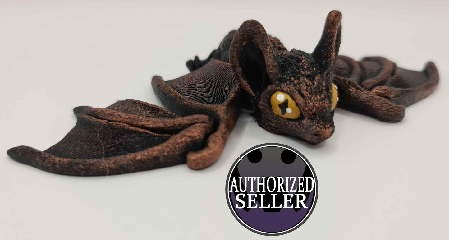3D printed brown dragon figurine with yellow eyes on white background, Authorized Seller badge
