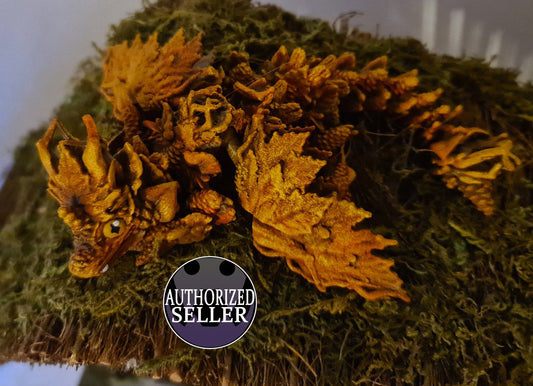 Handcrafted orange leaf dragon figurine on moss, fantasy decor, authorized seller badge
